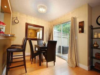 Photo 4: 38 2736 ATLIN Place in Coquitlam: Coquitlam East Townhouse for sale in "CEDAR GREEN ESTATES" : MLS®# V1137675