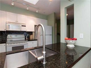 Photo 3: # 412 789 W 16TH AV in Vancouver: Fairview VW Condo for sale in "SIXTEEN WILLOWS" (Vancouver West)  : MLS®# V938093