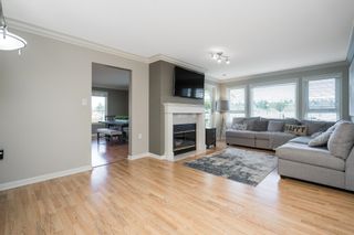 Photo 3: 307 17740 58A Avenue in Surrey: Cloverdale BC Condo for sale in "Derby Downs" (Cloverdale)  : MLS®# R2759682