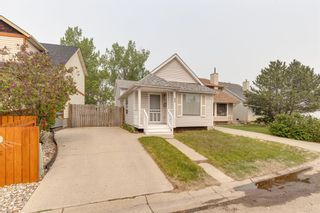 Photo 2: 92 Strandell Crescent SW in Calgary: Strathcona Park Detached for sale : MLS®# A2049782