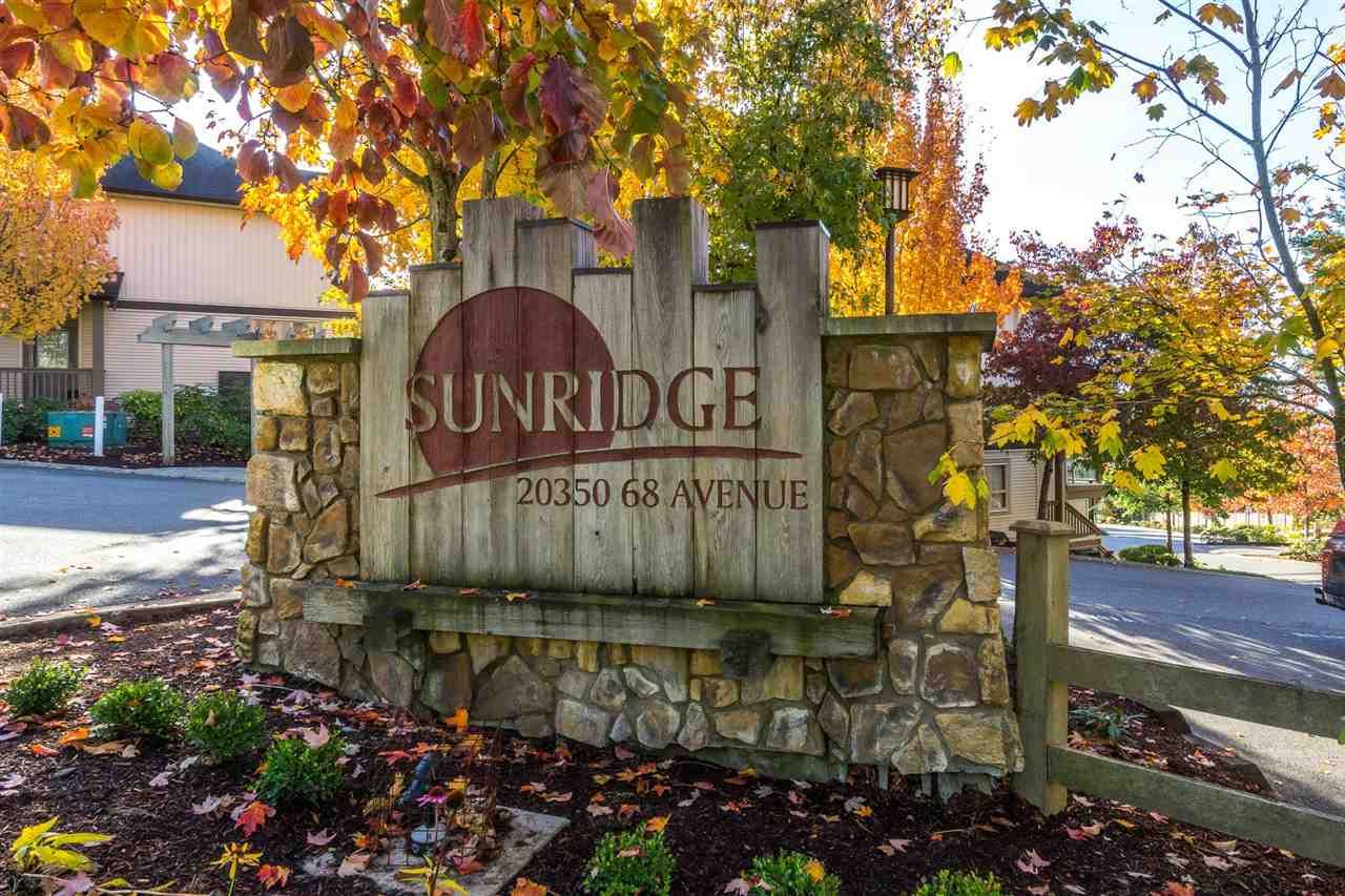 Main Photo: 13 20350 68 Avenue in Langley: Willoughby Heights Townhouse for sale in "SUNRIDGE" : MLS®# R2216625