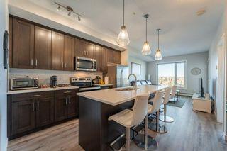 Photo 8: 405 71 Shawnee Common SW in Calgary: Shawnee Slopes Apartment for sale : MLS®# A2066734