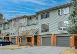 Photo 1: 39 Point Mckay Crescent NW in Calgary: Point McKay Row/Townhouse for sale : MLS®# A2052357