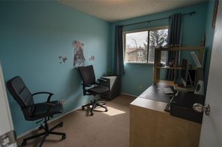 Photo 14: 147 Midbend Place SE in Calgary: Midnapore Row/Townhouse for sale : MLS®# A1041625