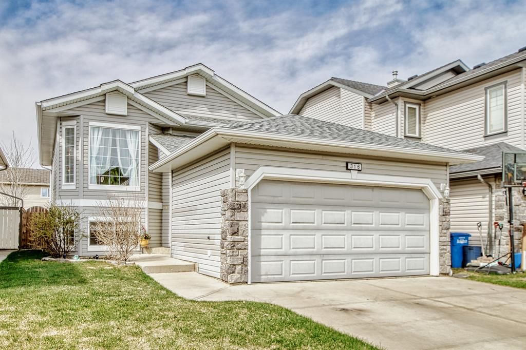 Main Photo: 316 Stonegate Way NW: Airdrie Detached for sale : MLS®# A2045734