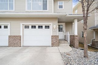 Photo 29: 76 Crystal Shores Cove: Okotoks Row/Townhouse for sale : MLS®# A1192998