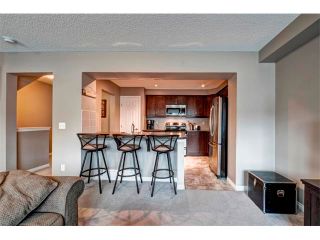 Photo 9: 113 WINDSTONE Mews SW: Airdrie House for sale : MLS®# C4016126