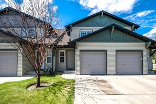 Photo 1: 5 Eversyde Court SW in Calgary: Evergreen Row/Townhouse for sale : MLS®# A1250724
