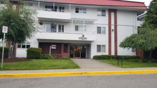 Photo 1: 203 12096 222 Street in Maple Ridge: West Central Condo for sale in "CANUCK PLAZA" : MLS®# R2702631
