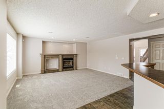 Photo 7: 12457 Crestmont Boulevard SW in Calgary: Crestmont Detached for sale : MLS®# A1203007