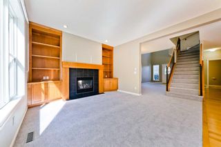 Photo 10: 59 St Moritz Terrace SW in Calgary: Springbank Hill Detached for sale : MLS®# A2080924