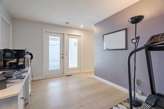 Photo 25: 84 Woodmeadow Close SW in Calgary: Woodlands Row/Townhouse for sale : MLS®# A2102464
