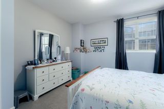 Photo 16: 3107 15 Sunset Square: Cochrane Apartment for sale : MLS®# A2011069