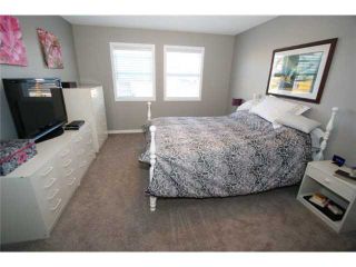Photo 13: 225 SUNSET Common: Cochrane Residential Attached for sale : MLS®# C3590396