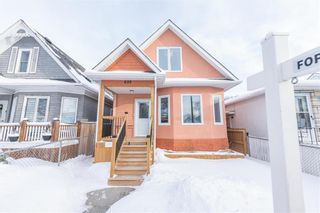 Photo 1: 699 Arlington Street in Winnipeg: West End Residential for sale (5A)  : MLS®# 202301271