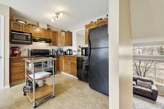 Photo 7: 127 Everhollow Heights SW in Calgary: Evergreen Row/Townhouse for sale : MLS®# A2127215