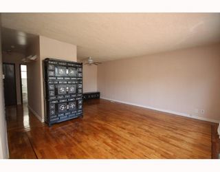 Photo 2: 5355 MCKINNON Street in Vancouver: Collingwood VE House for sale (Vancouver East)  : MLS®# V776153