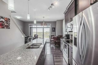 Photo 11: 1515 Symons Valley Parkway NW in Calgary: Evanston Row/Townhouse for sale : MLS®# A2077363