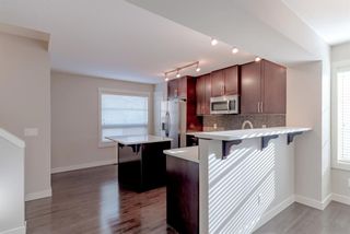 Photo 9: 18 Aspen Hills Common SW in Calgary: Aspen Woods Row/Townhouse for sale : MLS®# A1195955