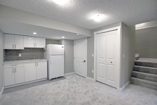 Photo 25: 563 Abinger Road NE in Calgary: Abbeydale Row/Townhouse for sale : MLS®# A1257421