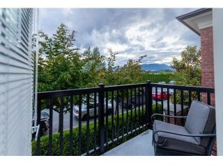 Photo 2: 41 2423 AVON Place in Port Coquitlam: Riverwood Townhouse for sale in "DOMINION" : MLS®# R2748162