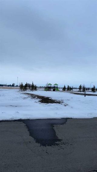 Photo 1: 37 Meadows Way: Taber Residential Land for sale : MLS®# A2118032