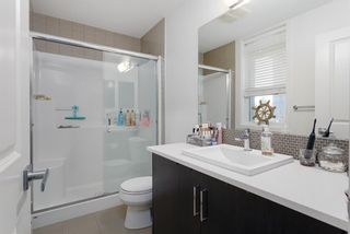 Photo 14: 211 25 Auburn Meadows Avenue SE in Calgary: Auburn Bay Apartment for sale : MLS®# A1214157