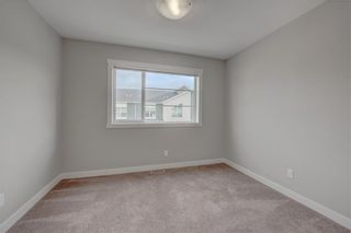 Photo 14: 405 Redstone View NE in Calgary: Redstone Row/Townhouse for sale : MLS®# A1224923