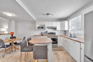 Photo 2: 115 4810 40 Avenue SW in Calgary: Glamorgan Row/Townhouse for sale : MLS®# A2123372