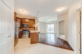 Photo 6: 1409 130 Panatella Street NW in Calgary: Panorama Hills Apartment for sale : MLS®# A2034336