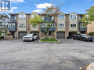 Photo 1: 3929 RIVERSIDE DRIVE East Unit# 3 in Windsor: House for sale : MLS®# 24009796