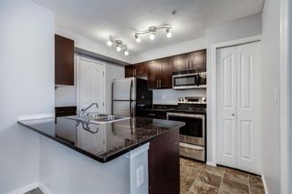 Photo 10: 4106 403 Mackenzie Way SW: Airdrie Apartment for sale : MLS®# A2117904