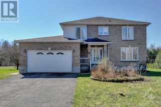 Photo 1: 113 HUNTLEY MANOR DRIVE in Carp: House for sale : MLS®# 1387156