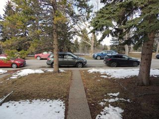 Photo 2: 2715 Canmore Road NW in Calgary: Banff Trail Semi Detached (Half Duplex) for sale : MLS®# A2120851
