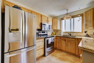 Photo 5: 147 Strathcona Close SW in Calgary: Strathcona Park Detached for sale : MLS®# A2127456