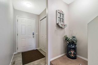 Photo 5: 174 Mt Aberdeen Manor SE in Calgary: McKenzie Lake Row/Townhouse for sale : MLS®# A2099841
