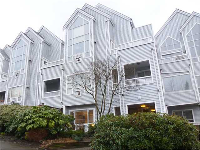 Main Photo: 102 1330 GRAVELEY Street in Vancouver: Grandview VE Condo for sale in "HAMPTON COURT-COMMERCIAL DRIVE" (Vancouver East)  : MLS®# V1050258