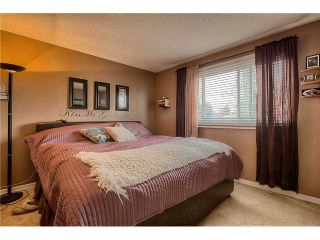 Photo 9: 869 QUEENSLAND Drive SE in CALGARY: Queensland Residential Attached for sale (Calgary)  : MLS®# C3616074
