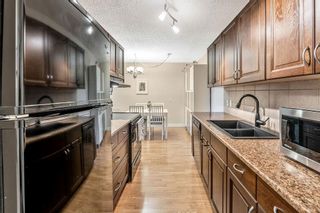 Photo 6: 412 3420 50 Street NW in Calgary: Varsity Apartment for sale : MLS®# A2053928