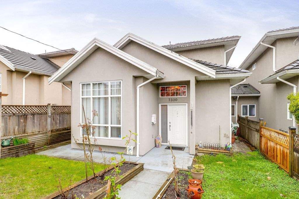 Main Photo: 7330 14TH Avenue in Burnaby: Edmonds BE 1/2 Duplex for sale (Burnaby East)  : MLS®# R2257150