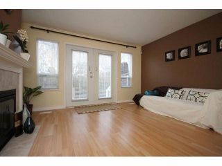 Photo 3: # 7 15488 101A AV in Surrey: Guildford Townhouse for sale in "COBBLEFIELD LANE" (North Surrey)  : MLS®# F1401306