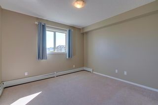 Photo 17: 9302 403 MACKENZIE Way SW: Airdrie Apartment for sale : MLS®# A1032027