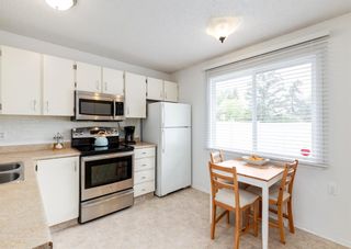 Photo 9: 535 Queenston Gardens SE in Calgary: Queensland Row/Townhouse for sale : MLS®# A1231832