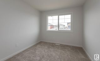Photo 14: 5702 JUCHLI Avenue in Edmonton: Zone 27 Attached Home for sale : MLS®# E4288449