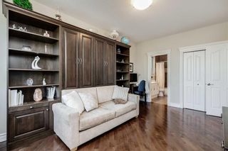 Photo 13: 16 Coulee Park SW in Calgary: Cougar Ridge Detached for sale : MLS®# A2125322