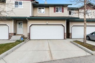 Photo 1: 111 2 Westbury Place SW in Calgary: West Springs Row/Townhouse for sale : MLS®# A1112169