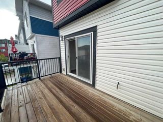 Photo 14: 2301 Jumping Pound Common: Cochrane Row/Townhouse for sale : MLS®# A2064413