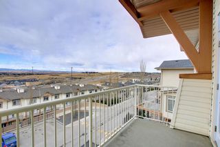 Photo 26: 14 140 Rockyledge View NW in Calgary: Rocky Ridge Row/Townhouse for sale : MLS®# A1199471