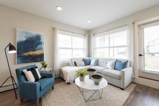 Photo 3: 105 19621 40 Street SE in Calgary: Seton Apartment for sale : MLS®# A2022826