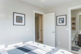 Photo 24: 159 Cranbrook Walk SE in Calgary: Cranston Row/Townhouse for sale : MLS®# A2030244